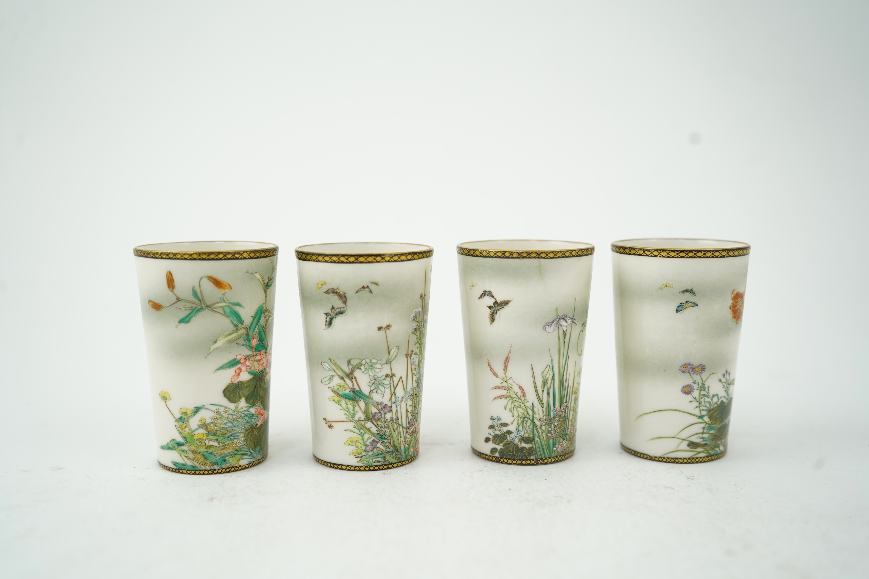 A set of four Japanese porcelain tumbler cups, by Kinkozan, Meiji period